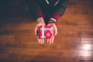 a wrapped gift in hands